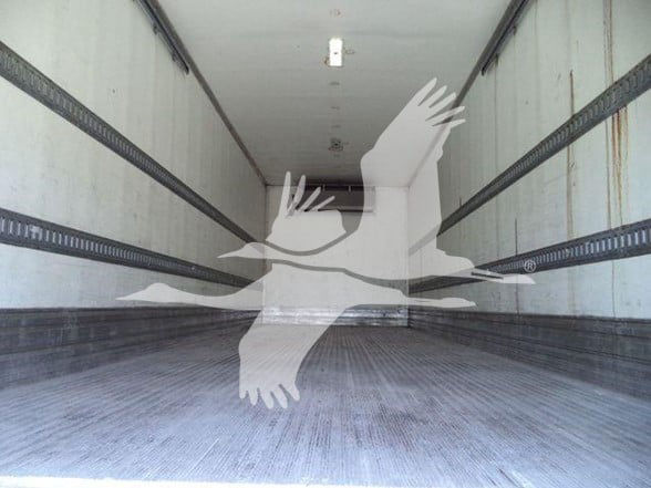 Trailer interior empty reefer truck trailer with wooden floor and metal side rails, stock number 26198RFM.
