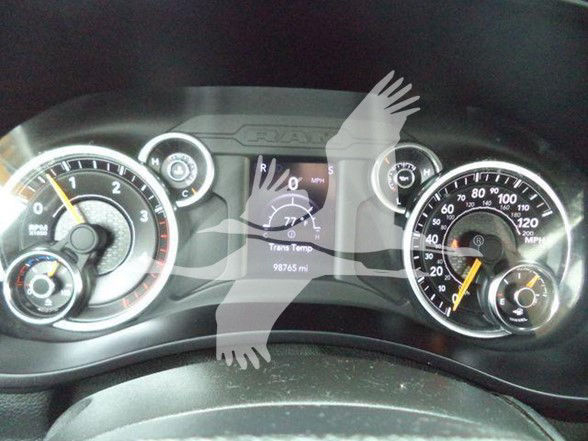 Dashboard of a 2021 Ram 4500 showing instrument gauges and center display with 'Trans Range' and mileage text.