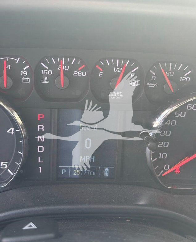 Dashboard view of a 2019 International CV showing gear selector PRNDL1, digital speedometer at 0 MPH, and several gauges.