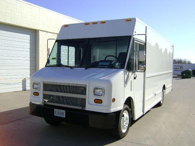 2001 Freightliner MT45 box truck with cargo box, front grille, and white exterior.