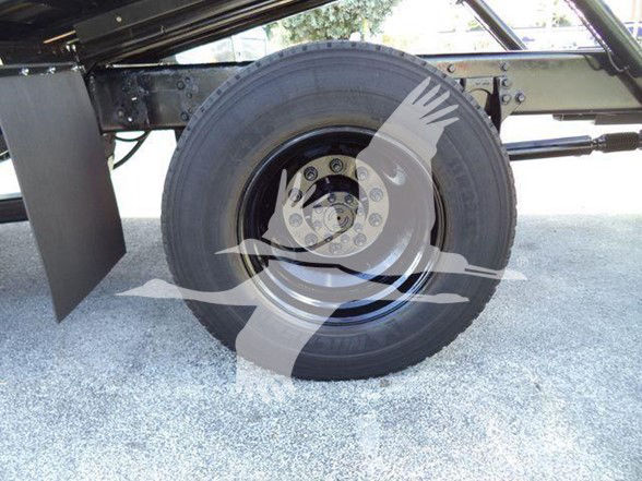 Wheel and suspension area of a 2019 International DURASTAR 4300 chassis showing a single rear tire and surrounding frame.