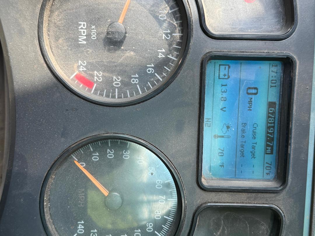 Dashboard of a 2016 Mack CXU 612 showing gauges and a digital display. RPM gauge up to 24, foot, and an LCD panel with 0 mph and various readouts.