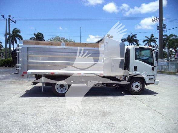Isuzu NQR dump truck side view showing aluminum dump bed and cab, stock number T02679FM.
