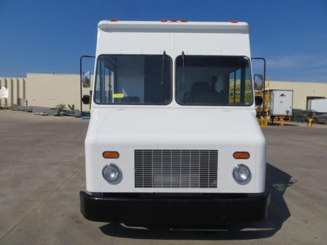Front view of a white 2008 Freightliner MT45 step van with large windshield, two round headlights, and a black front bumper.