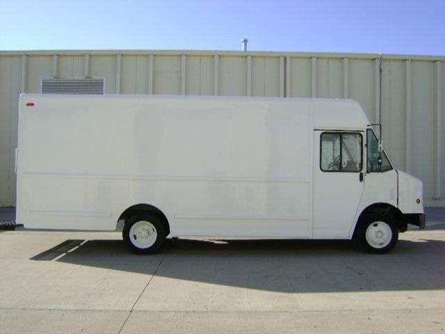 White Freightliner MT45 step van side view showing cargo box and cab; no visible decals or text.