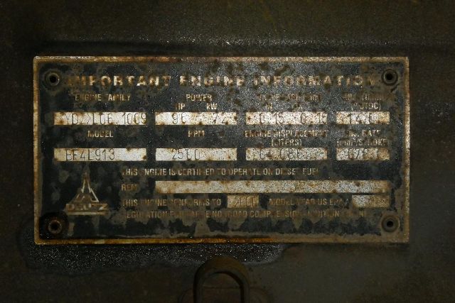 Plate with engine information: labels and numbers etched; appears to be OEM data plate with Gen Info, Power, Fuel Type, and engine model information. Visible text includes BENZ? and numbers such as 91? 1009? 251? 25? (hard to read).