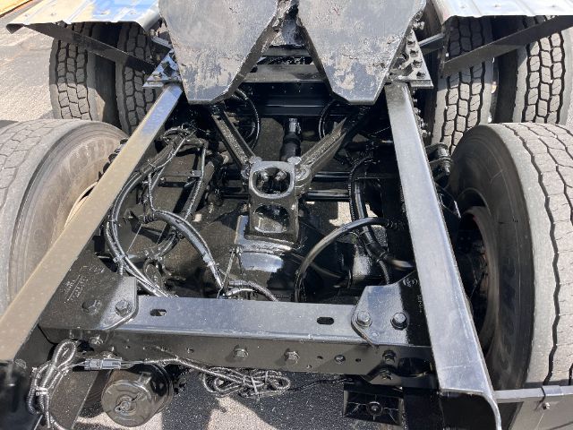 Kenworth T800 chassis rear undercarriage showing drivetrain and suspension components.