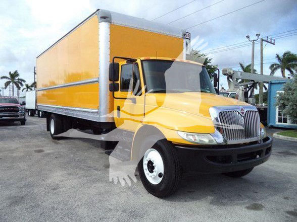 International DURASTAR 4300 box truck in yellow with cargo box, front grille, and side mirrors visible.