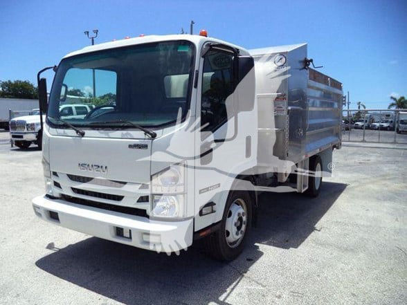 Isuzu NQR dump truck in a lot with white cab and dump body, front three-quarter view.