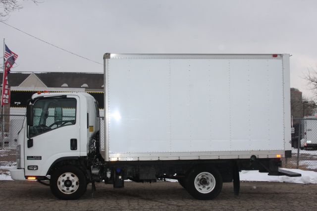 Isuzu NPR-HD box truck with white cargo box and cab, VIN plate not visible, stock number 19011 in listing background.