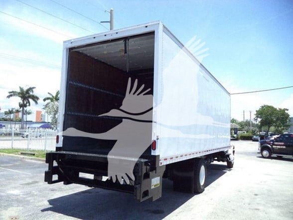 Box truck with empty cargo box, International DURASTAR 4300 rear and side views.