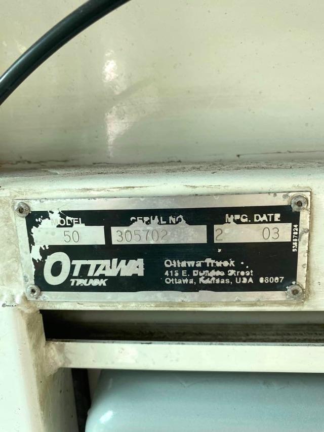 Ottawa Truck data plate showing Model 50, Serial No 305702, Mfg Date 2 03, Ottawa Truck address in Ottawa, Kansas, USA.