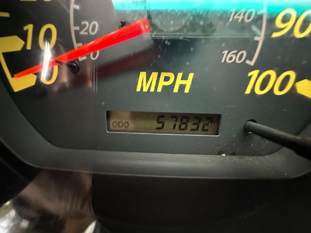 Dashboard showing speedometer with MPH, odometer reading 57832.