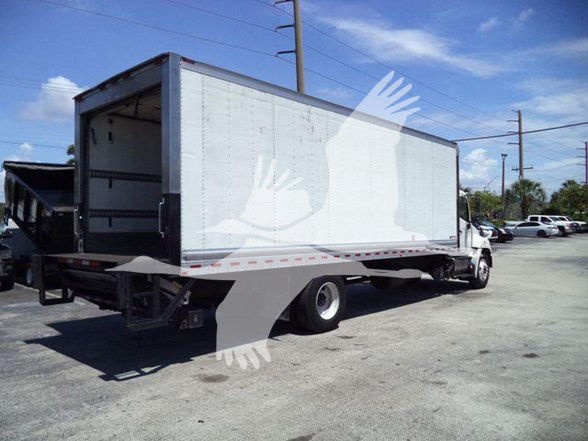 (Truck) 2019 reefer box truck with a large cargo box and loading ramp, side view showing rear doors open, white box trailer with reflective striping.