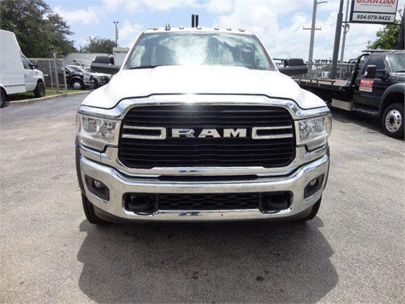 Ram 4500 front view showing bold grille with RAM lettering and chrome bumper.