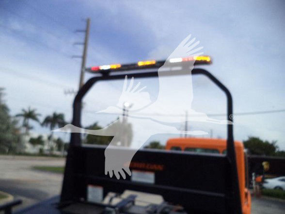 Kenworth T280 truck bed with rear window and orange cab visible, stock number T280ORANGE22XLP, tow category.
