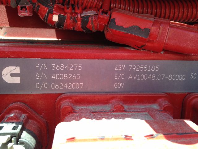 Peterbilt VN engine bay label showing P/N 3684275, S/N 4008265, D/C 06242007, ESN 79255185, E/C A/V 10048.07-80000 GOV.