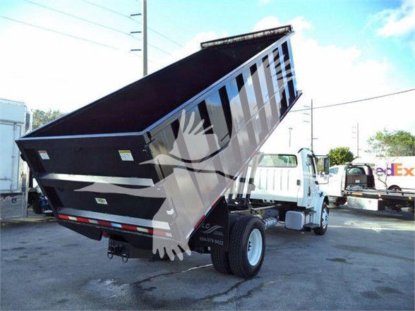 Dump bed truck rear angled, Freightliner Business Class M2 106? 2012 text not fully visible; watermark on image.