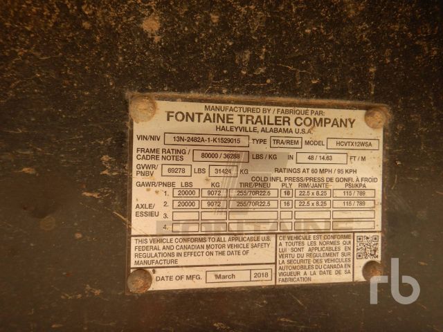 Label plate on Fontaine Trailer Company frame with VIN, model HCVTX12WSA, 40 ton capacity, and various ratings.